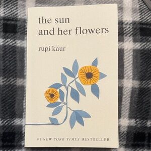 The Sun and Her Flowers Book